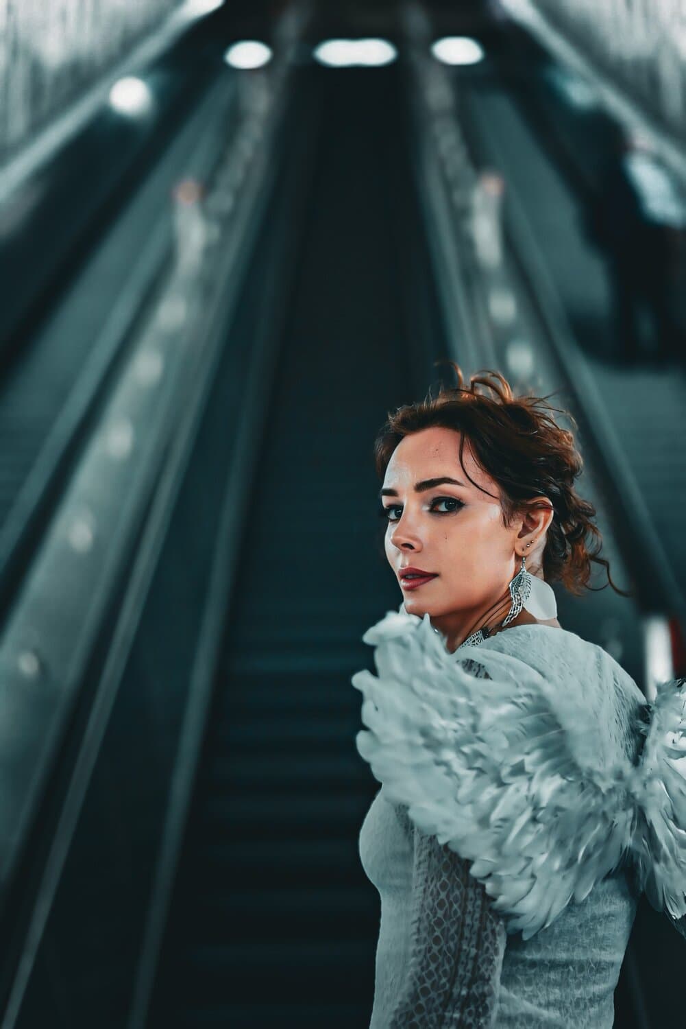 Arielle in white feathers